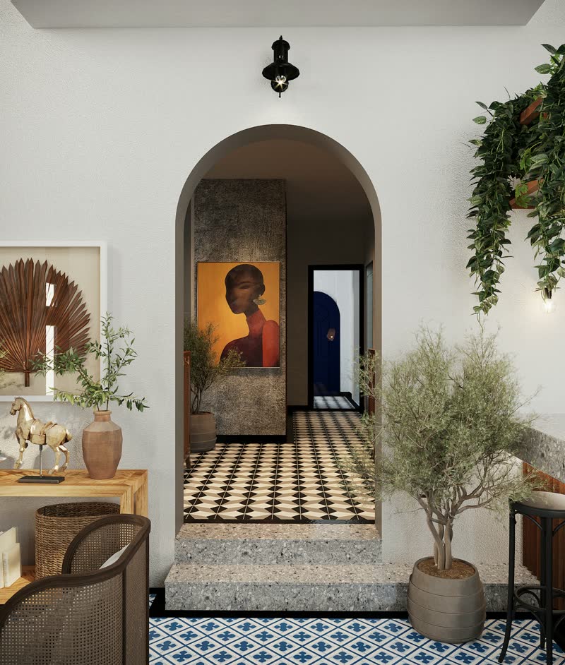 An arched hallway with a checkered floor, plants and a portrait on the wall